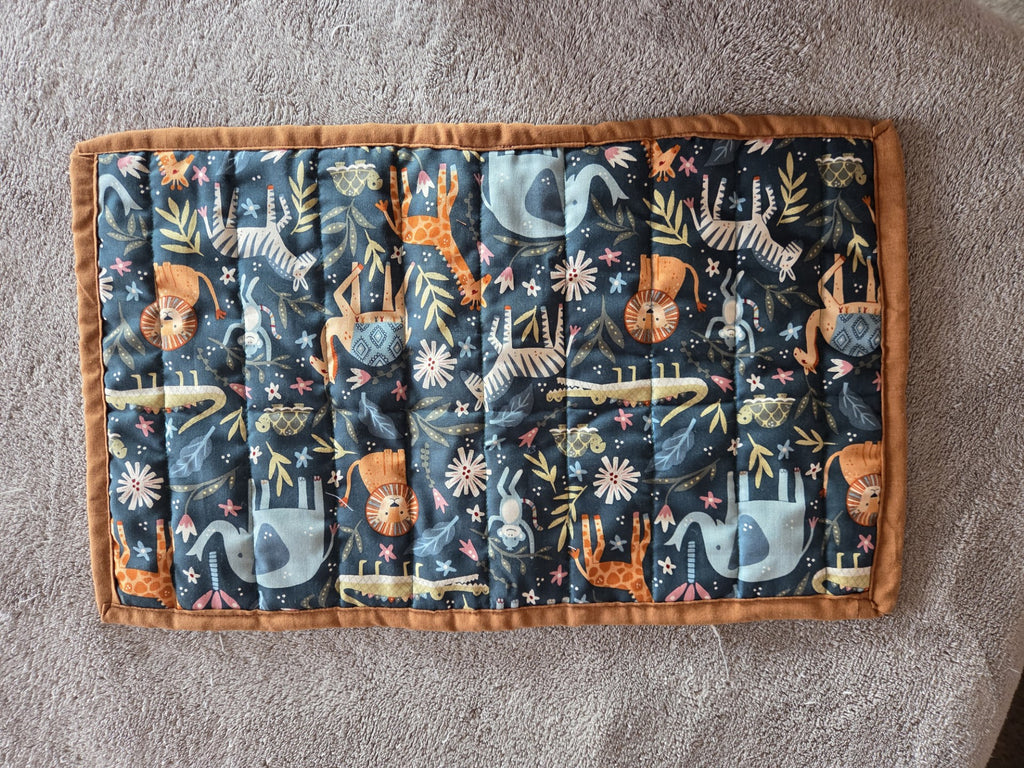 Fabric with animal pattern on a gray surface