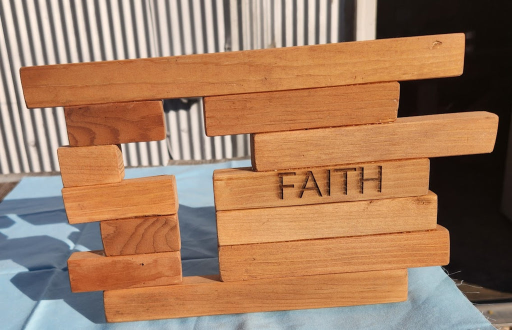 Wooden block cross with 'FAITH' engraved 