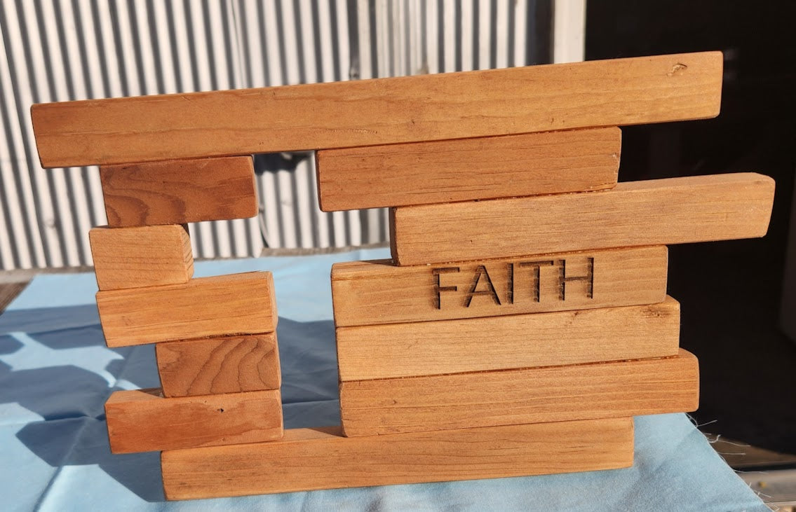Wooden block cross with 'FAITH' engraved 