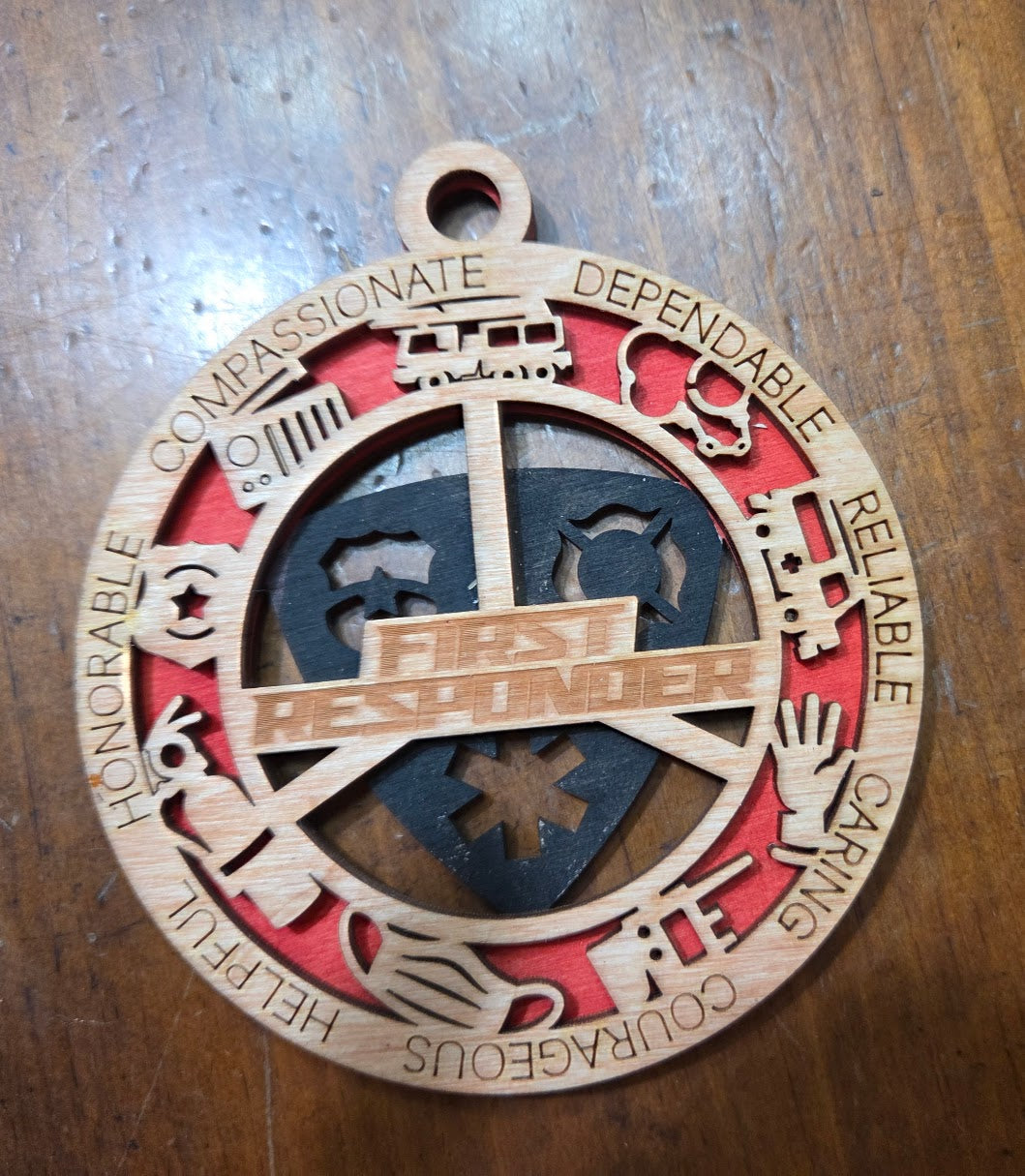 Wooden pendant with engraved text and symbols on a wooden surface