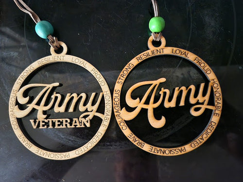 Two circular wooden pendants with Army  or Army Veteran text on a dark background