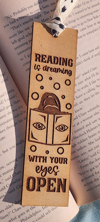 Bookmark with text and graphics on a book page background