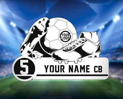 Soccer cleats, ball, and number 5 on a sports field background